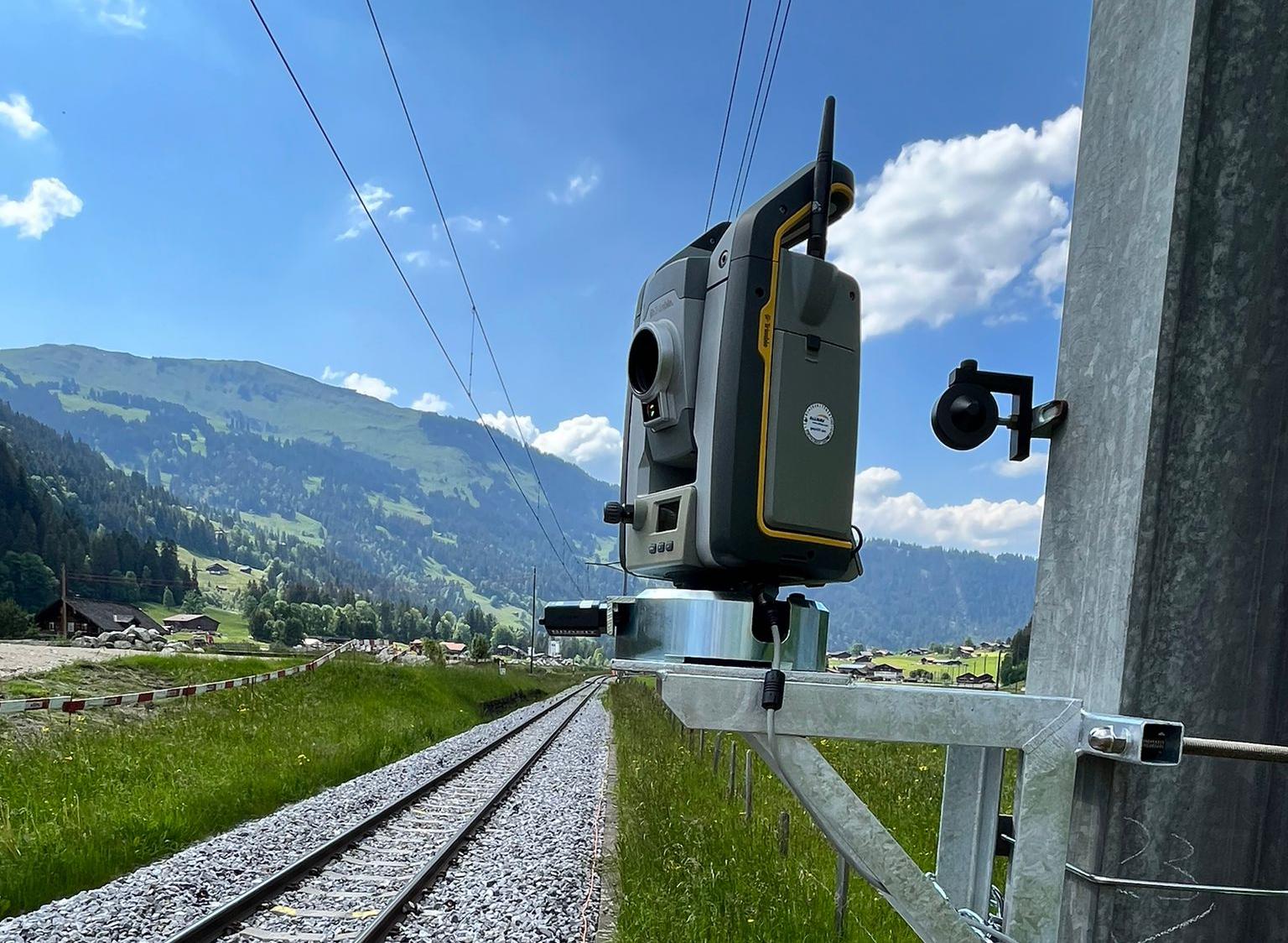 Monitoring total station mounted beside rail track